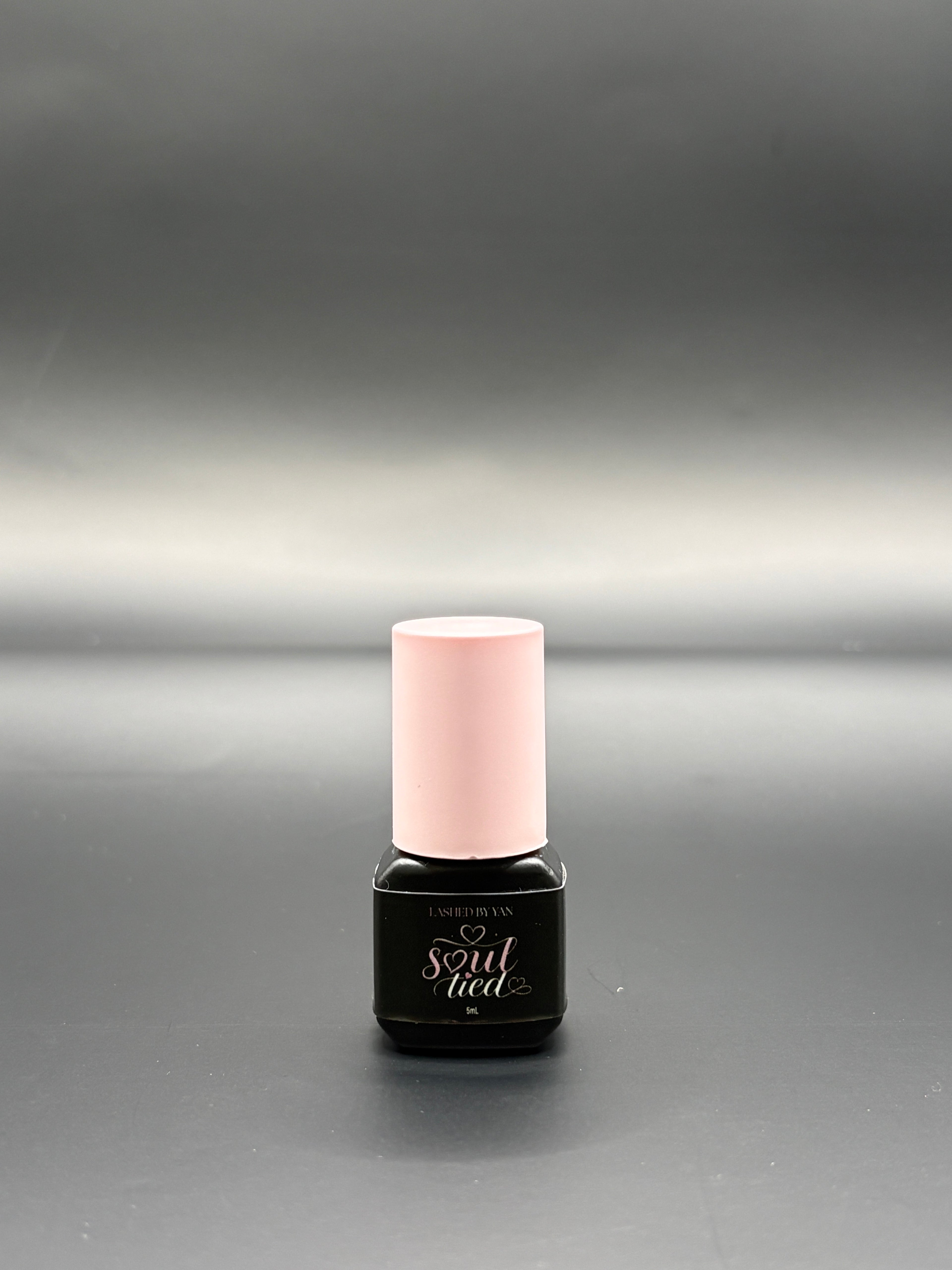 “Soul tied” lash adhesive